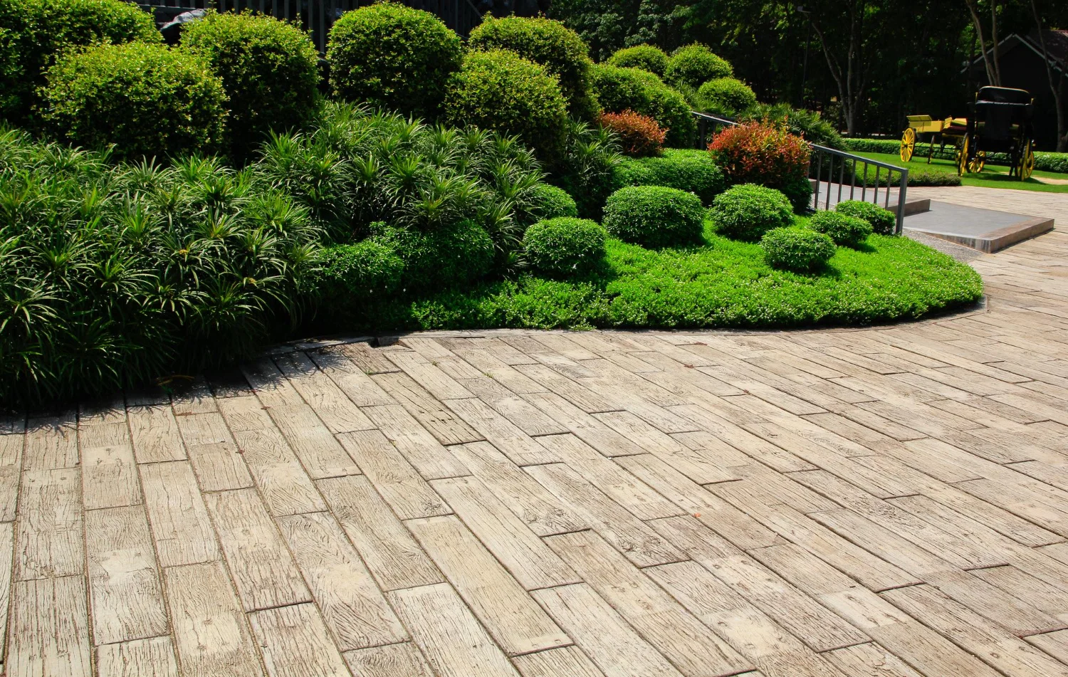 Professional paver and flagstone installation by landscaping contractor in residential yard